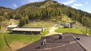 Archived webcam image showing Forni di Sopra - Malga Varmost Live Cam on 13 May 2026 at 10:12