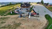 Archived webcam image showing Bukowina Tatrzanska: Ski lifts Rusin-Ski on 28 Jun 2026 at 16:33