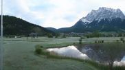 Archived webcam image showing Tiroler Zugspitz Arena - Golf Club Ehrwald-Lermoos on 13 May 2026 at 06:24