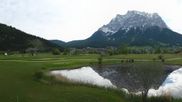 Archived webcam image showing Tiroler Zugspitz Arena - Golf Club Ehrwald-Lermoos on 13 May 2026 at 08:24