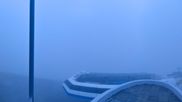 Archived webcam image showing Crans Montana - Top station La Tsa chair lift on 18 Sep 2026 at 07:47