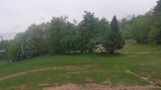 Archived webcam image showing Nowa Osada - Top station chair lift on 17 May 2026 at 06:21