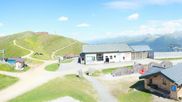 Archived webcam image showing Wildkogel-Arena: Top station Wildkogel gondola on 4 Jul 2026 at 16:42