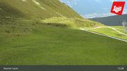 Archived webcam image showing Axamer Lizum - Karleiten lift and Snow Park on 9 Aug 2026 at 13:02