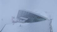 Archived webcam image showing Axamer Lizum: Hoadl-Haus und Top station Olympiabahn on 12 Mar 2026 at 08:51