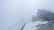 Archived webcam image showing Axamer Lizum: Hoadl-Haus und Top station Olympiabahn on 12 Mar 2026 at 16:51