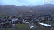 Archived webcam image showing Livigno: Ski School Area and Tagliede Gondola on 21 Oct 2026 at 08:49