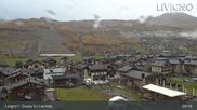Archived webcam image showing Livigno: Ski School Area and Tagliede Gondola on 21 Oct 2026 at 09:49