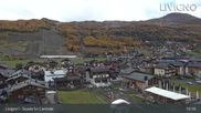 Archived webcam image showing Livigno: Ski School Area and Tagliede Gondola on 21 Oct 2026 at 15:49