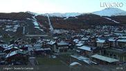 Archived webcam image showing Livigno: Ski School Area and Tagliede Gondola on 27 Oct 2026 at 07:14