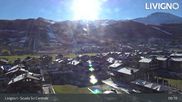 Archived webcam image showing Livigno: Ski School Area and Tagliede Gondola on 27 Oct 2026 at 09:14