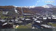 Archived webcam image showing Livigno: Ski School Area and Tagliede Gondola on 27 Oct 2026 at 11:14