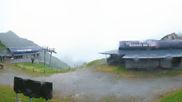 Archived webcam image showing Top station of Reckmoos chairlift on 6 Jul 2026 at 07:34