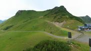 Archived webcam image showing Top station of Reckmoos chairlift on 6 Jul 2026 at 12:34