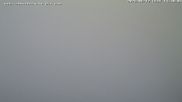 Archived webcam image showing Puchberg am Schneeberg Fischerhütte southwards on 12 Jun 2026 at 14:08