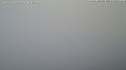 Archived webcam image showing Puchberg am Schneeberg Fischerhütte southwards on 27 Jul 2026 at 14:15