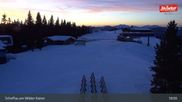 Archived webcam image showing Scheffau at mountain range Wilder Kaiser on 26 Feb 2026 at 19:13