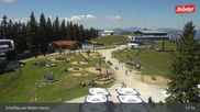 Archived webcam image showing Scheffau at mountain range Wilder Kaiser on 12 Jul 2026 at 13:47