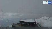 Archived webcam image showing Nebelhorn Top Station (Oberstdorf) on 21 Mar 2026 at 13:10