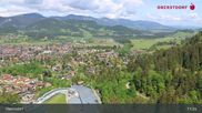 Archived webcam image showing Oberstdorf: Ski Jump Area on 21 May 2026 at 11:34