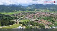 Archived webcam image showing Oberstdorf: Ski Jump Area on 11 Jun 2026 at 13:40