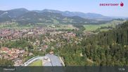 Archived webcam image showing Oberstdorf: Ski Jump Area on 15 Aug 2026 at 11:18