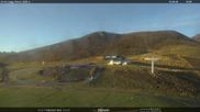Archived webcam image showing Fassatal - Moena - arrival of the chairlift 