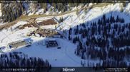 Archived webcam image showing Fassatal - San Pelegrino - panorama view of the ski-piste and liftmachinery of the 