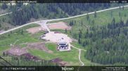 Archived webcam image showing Fassatal - San Pelegrino - panorama view of the ski-piste and liftmachinery of the 