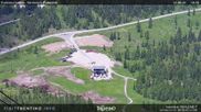 Archived webcam image showing Fassatal - San Pelegrino - panorama view of the ski-piste and liftmachinery of the 