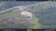 Archived webcam image showing Fassatal - San Pelegrino - panorama view of the ski-piste and liftmachinery of the 
