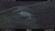 Archived webcam image showing Fassatal - San Pelegrino - panorama view of the ski-piste and liftmachinery of the 
