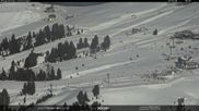 Archived webcam image showing Val di Fiemme, Rifugi Zisch and Genischer on Feb 26, 2026 at 10:30 AM