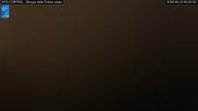 Archived webcam image showing Cortina d'Ampezzo: World Cup slope from Rifugio Duca d'Aosta on 23 Aug 2026 at 00:56