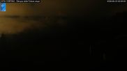 Archived webcam image showing Cortina d'Ampezzo: World Cup slope from Rifugio Duca d'Aosta on 23 Aug 2026 at 02:56