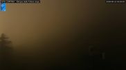Archived webcam image showing Cortina d'Ampezzo: World Cup slope from Rifugio Duca d'Aosta on 23 Aug 2026 at 04:56