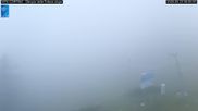 Archived webcam image showing Cortina d'Ampezzo: World Cup slope from Rifugio Duca d'Aosta on 23 Aug 2026 at 07:56