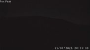 Archived webcam image showing Fox Peak base station at the Meadow Tow on 21 Mar 2026 at 18:22