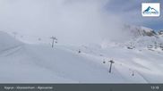 Archived webcam image showing Kitzsteinhorn Kaprun: Alpine Centre on 18 Mar 2026 at 13:30