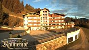 Archived webcam image showing Reiteralm: View Hotel Raunerhof on 18 May 2026 at 06:08