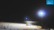 Archived webcam image showing Base station of t-bar lift in ski resort Jauerling on 26 Feb 2026 at 20:32