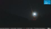 Archived webcam image showing Base station of t-bar lift in ski resort Jauerling on 24 Apr 2026 at 00:14
