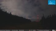 Archived webcam image showing Base station of t-bar lift in ski resort Jauerling on 25 Sep 2026 at 00:18