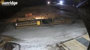 Archiviertes Webcam Bild: Sunridge Bunny Hill - Blick vom Chalet im Tal am 12.04.2026 um 12:35 Uhr