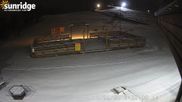 Archiviertes Webcam Bild: Sunridge Bunny Hill - Blick vom Chalet im Tal am 16.04.2026 um 12:33 Uhr