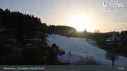Archived webcam image showing Winterberg ski resort: chair lift "Rauher Busch" on 26 Feb 2026 at 17:59