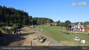 Archived webcam image showing Winterberg ski resort: chair lift "Rauher Busch" on 6 Aug 2026 at 08:11