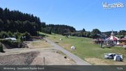 Archived webcam image showing Winterberg ski resort: chair lift "Rauher Busch" on 11 Aug 2026 at 13:57