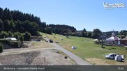 Archived webcam image showing Winterberg ski resort: chair lift "Rauher Busch" on 11 Aug 2026 at 15:57