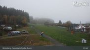 Archived webcam image showing Winterberg ski resort: chair lift "Rauher Busch" on 30 Oct 2026 at 08:34